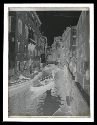 View of a Canal with a Gondola in Venice