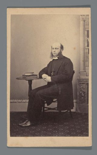 Portrait of an unknown man seated on a chair