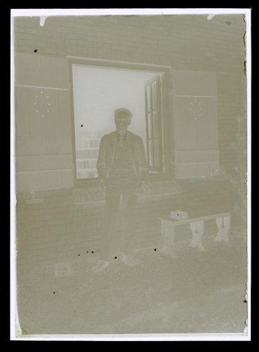 Portrait of Alphons Diepenbrock outdoors in front of his house 'Holtwick' at Laren