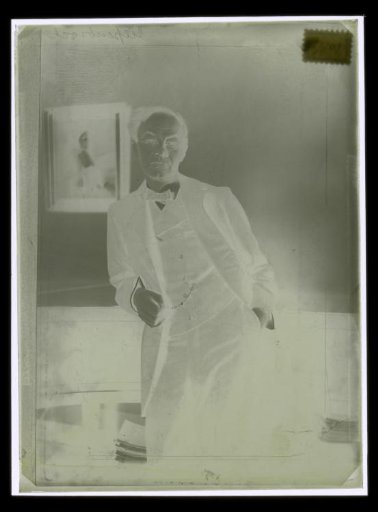 Portrait of Alphons Diepenbrock standing in a room