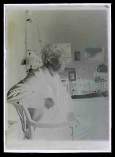 Portrait of Alphons Diepenbrock seated on a chair, seen from the side