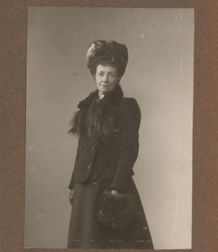 Portrait of a woman with a cap and muffs