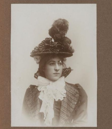 Portrait of a young woman with a hat