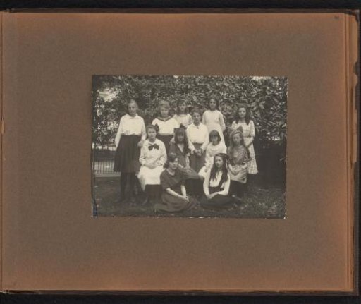 Page from the Diepenbrock family photo album with a group portrait of young women