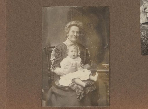 Woman with Young Child on Her Lap
