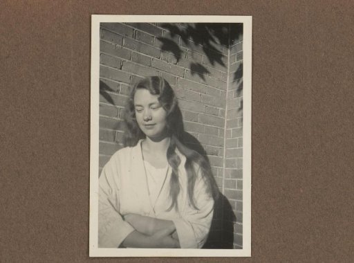 Young Woman before a Wall