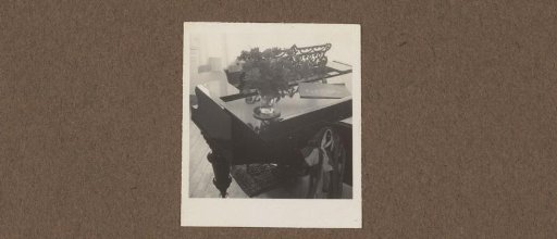 Vase with Flowers on a Piano