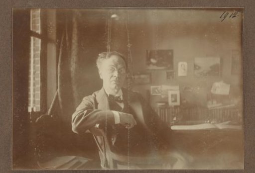 Alphons Diepenbrock seated in an interior