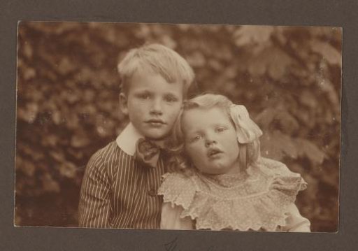 Portrait of a boy and a girl outdoors