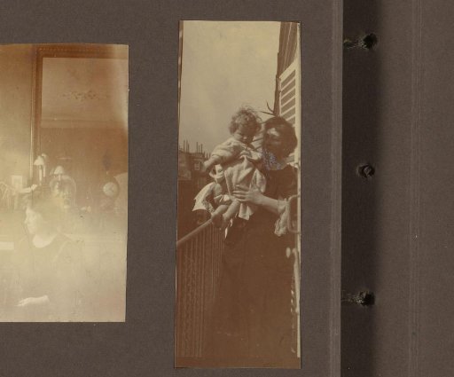 Elsa Diepenbrock on a balcony with a toddler on her arm, presumably her daughter Thea or Joanna Diepenbrock