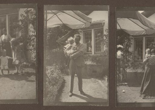 Alphons Diepenbrock with daughter Thea in his arms in the garden of Villa de Hoeve