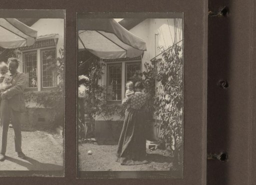 Woman with child in her arms in the garden of Villa de Hoeve in Laren, presumably Elsa and Thea Diepenbrock