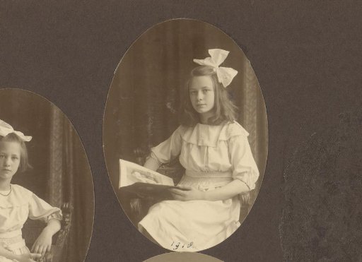 Portrait of Joanna Diepenbrock seated with a book
