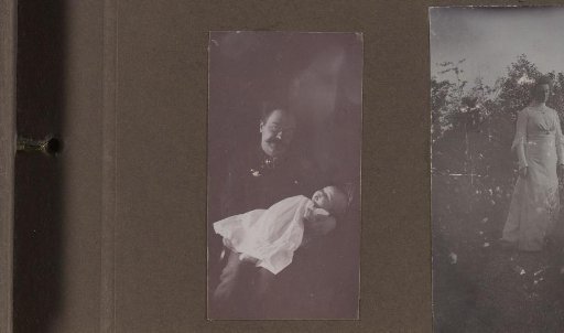 Portrait of Alphons Diepenbrock with a baby on his arm, presumably Thea or Joanna Diepenbrock