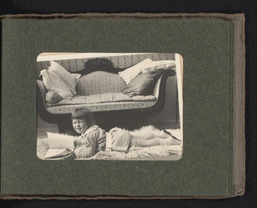 Cay van den Berg, reading on the ground