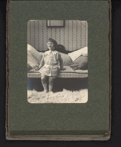 Cay van den Berg, leaning on a sofa
