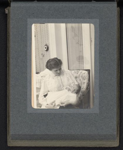 Caroline van den Berg with baby Frank on her lap