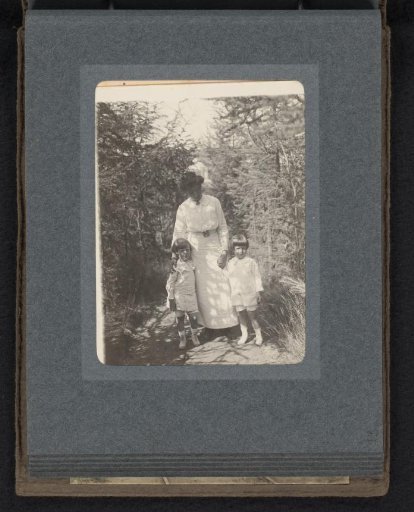Woman with Cay van den Berg and Another Boy in the Garden of Blaricum