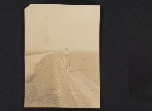 Caroline van den Berg on a bicycle