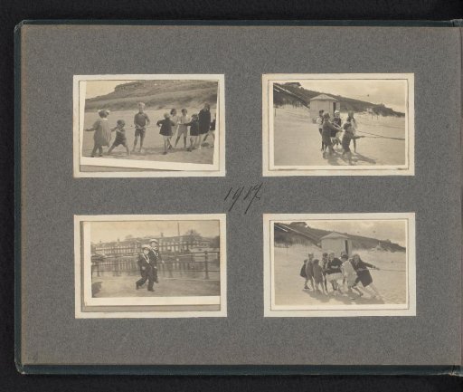 Children, including Carel and Frank van den Berg, on a beach