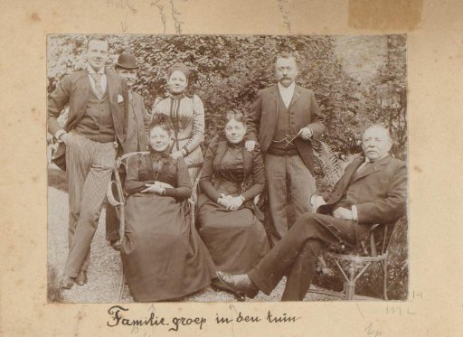 Group portrait of the Van den Berg family in the garden