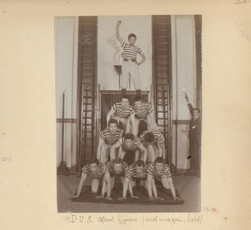 Ten Boys Forming a Pyramid During Gymnastics