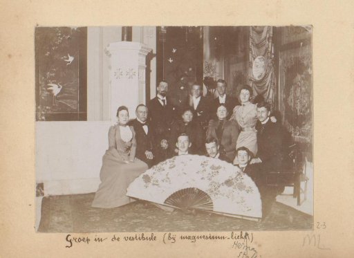 Group portrait in the vestibule with a large fan