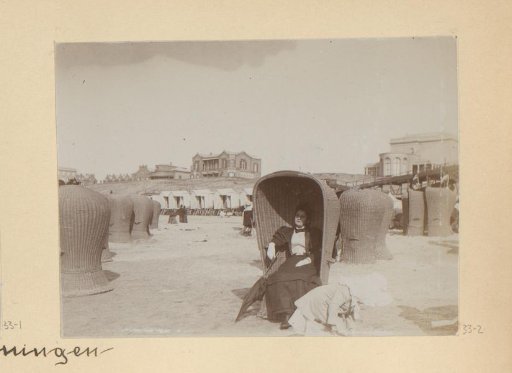 Woman in a beach chair on the beach of Scheveningen