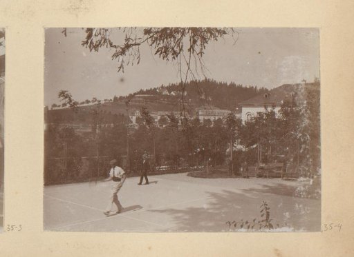Two men on a tennis court