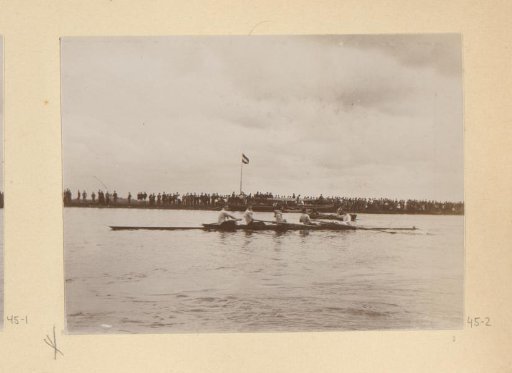 Two rowing crews during a race