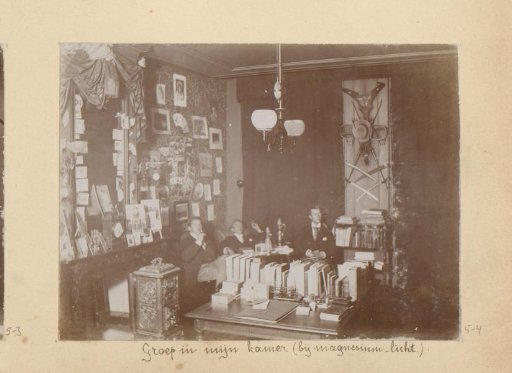 Three young men in the room of Hendrik Herman van den Berg