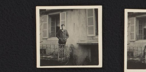 Man standing before a house