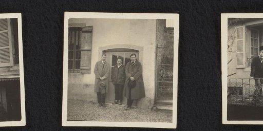 Three Men in Front of a House