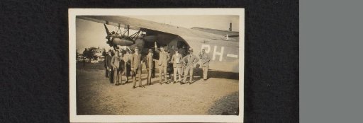 Group of Men with an Airplane