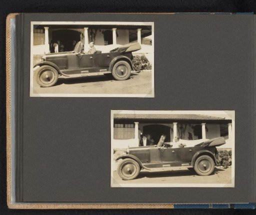 Two Men Posing in a Car in Front of a Country House in South Africa