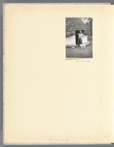 Portrait of presumably Norbertus Petrus van den Berg with dog Popsy at a house in South Africa