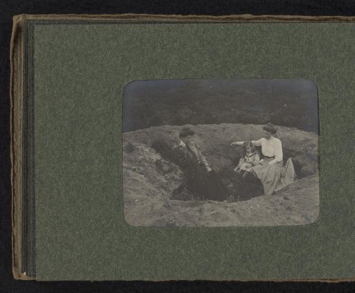 Three members of the Van den Berg family in a sand pit on the heath in Huis ter Heide