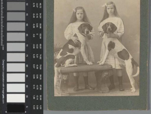 Studio portrait of Loentje and Willy Onnen with two dogs