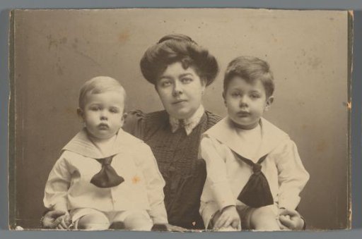 A.C.M. Geertsema between her two young children