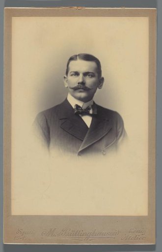 Studio portrait of Frans Alexander van den Berg with a bow tie