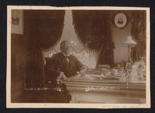 Portrait of Mr. Norbert Petrus van den Berg behind his desk in his study at Turfmarkt 3, Amsterdam