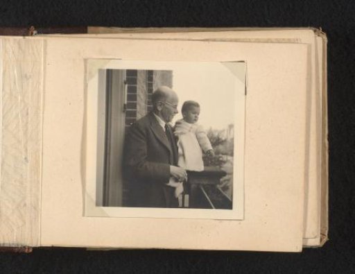 Hendrik Herman van den Berg with Granddaughter Louise Caroline van den Berg in Baptismal Robes on a Balcony
