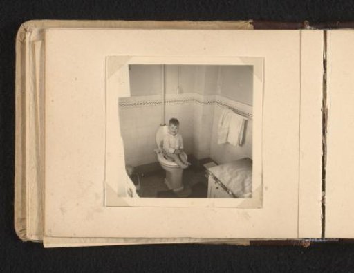 Norbert Peter van den Berg as a toddler on the toilet