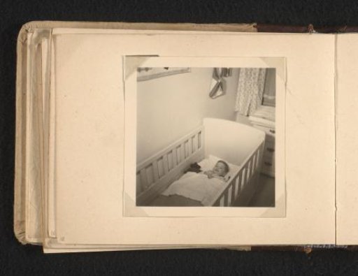 Norbert Peter van den Berg as a toddler in bed