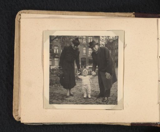 Hendrik Hermanen and Caroline Louise van den Berg hand-in-hand with grandson Norbert Peter van den Berg