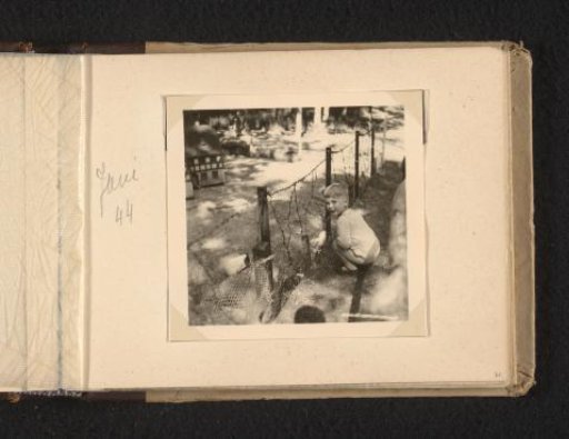 Norbert Peter van den Berg as a Toddler with a Cage of Guinea Pigs
