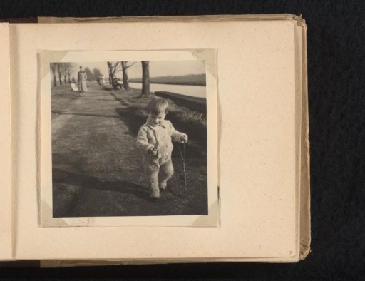 Norbert Peter van den Berg as a toddler on a road by a canal