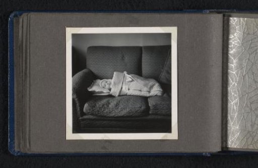 Norbert Peter van den Berg as a newborn baby in a blanket on a bench
