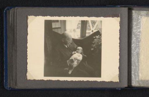 Hendrik Herman van den Berg with newborn grandson Norbert on his lap