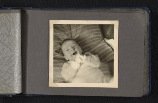 Portrait of a Laughing Norbert Peter van den Berg as a Baby, Lying on a Cushion